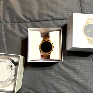 Fossil smart watch rose gold in mint condition only worn a few times.